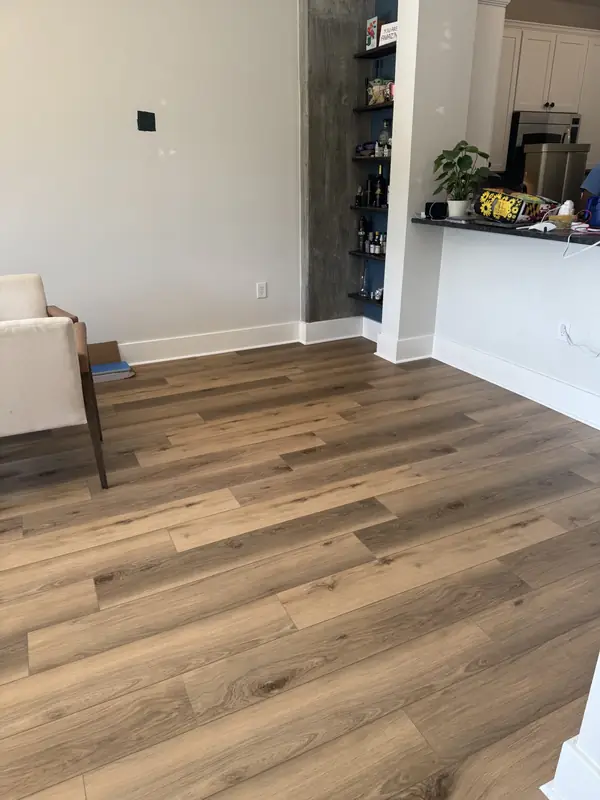 Open living space with new LVP flooring