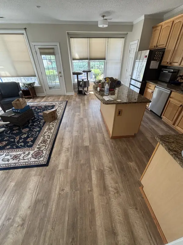 Kitchen and family room with new LVP flooring